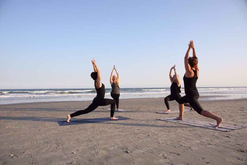 yogini-sun-salutation-beach-ommygod